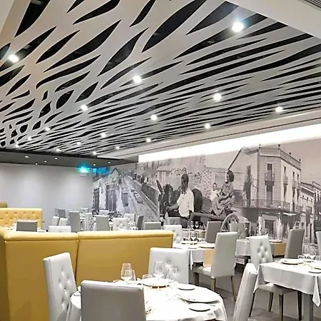 & Ciudad De 4*