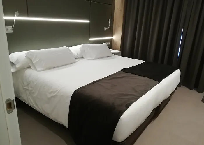 & Ciudad De 4* Binéfar