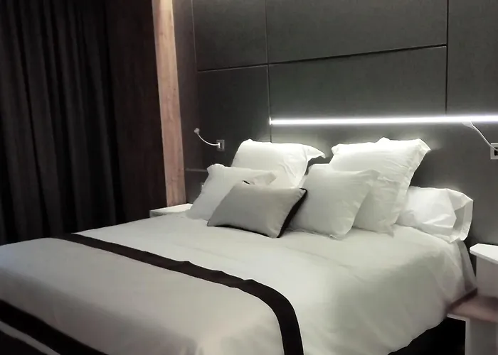 & Ciudad De 4* Binéfar